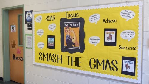 The Georgia Board of Education approved a temporary waiver for use of math Milestones scores in promotion and retention decisions in fifth and eighth grades. This is a Georgia Milestones Assessment bulletin board at Thurgood Marshall Elementary School in Clayton County on April 19, 2022. Teachers and faculty create the bulletin boards about a month before testing as a way to motivate and encourage students. (Natrice Miller / natrice.miller@ajc.com)