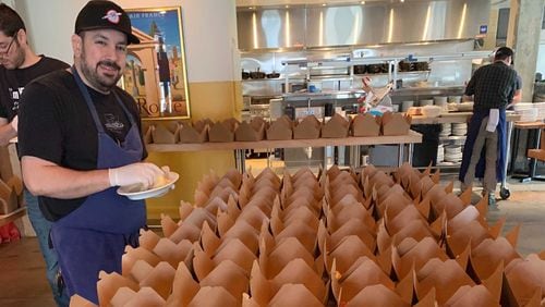 Employees at Forza Storico prep meals for Atlanta Healthcare Heroes program. Credit: Michael Patrick