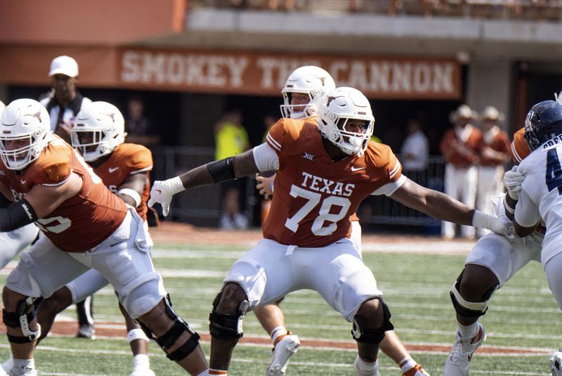 FILE - Texas offensive lineman Kelvin Banks (78) blocks during the first half of an NCAA football game against Rice, Saturday, Sept. 2, 2023, in Austin, Texas. (AP Photo/Michael Thomas, File)