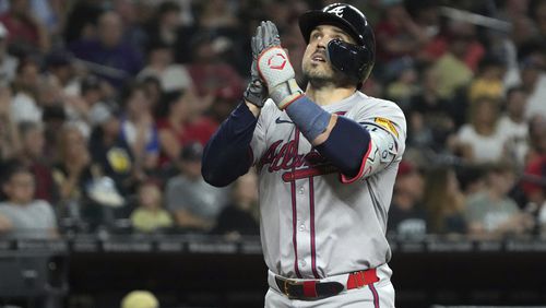 Atlanta Braves' Adam Duval reacts after hitting a three-run home run against the Arizona Diamondbacks in the sixth inning during a baseball game Tuesday, July 9, 2024, in Phoenix. (AP Photo/Rick Scuteri)