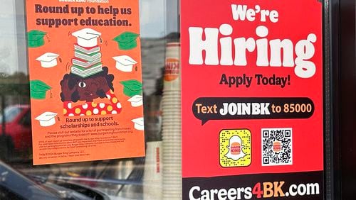 FILE - A hiring sign is displayed at a restaurant in Wheeling, Ill., May 16, 2024. On Thursday, June 20, 2024, the Labor Department reports on the number of people who applied for unemployment benefits last week. (AP Photo/Nam Y. Huh, File)