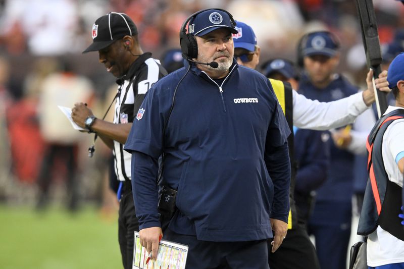 Dallas Cowboys head coach Mike McCarthy walks along the sideline in the second half of an NFL football game against the Cleveland Browns in Cleveland, Sunday, Sept. 8, 2024. (AP Photo/David Richard)