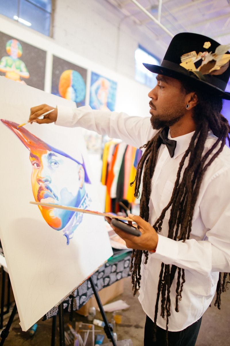 Artist Keenan Chapman works on an original piece during "A Marvelous Black Boy Art Show." Courtesy of Bosa LaNova
