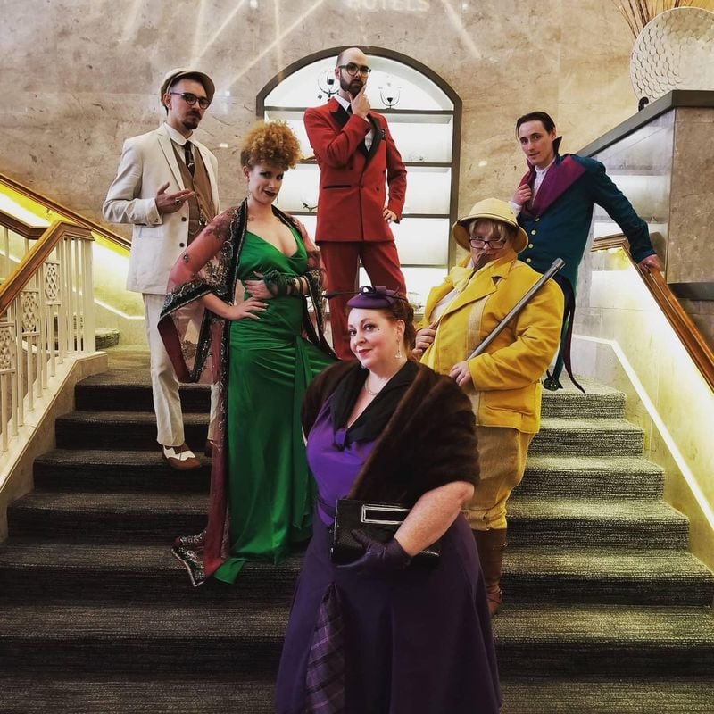 A group of Outlantacon attendees dressed as characters from the game “Clue” have to solve a murder mystery. (Courtesy Candace Weslosky)