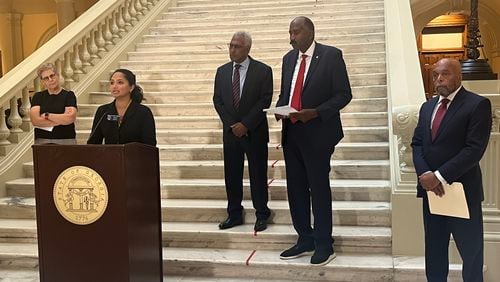 State Sen. Nabilah Islam Parkes speaks at the Georgia Capitol on Wednesday about a lawsuit seeking to force Gov. Brian Kemp to start an ethics hearing into the State Election Board. She was joined by former Fulton County Election Board Chair Cathy Woolard, Atlanta NAACP President Richard Rose, Democratic state Senate candidate Randal Mangham and attorney Kendall Wayne. MARK NIESSE / MARK.NIESSE@AJC.COM