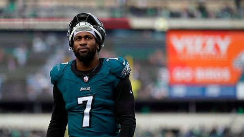 FILE - Then-Philadelphia Eagles' Haason Reddick walks off the field at halftime of an NFL football game, Sunday, Dec. 31, 2023, in Philadelphia. A person with knowledge of the situation says New York Jets defensive end Haason Reddick is not planning to report to training camp with the rest of his teammates as he seeks a new contract. Reddick was acquired from Philadelphia during the offseason and is scheduled to make $14.25 million in base salary in the final year of his deal. (AP Photo/Matt Slocum, File)