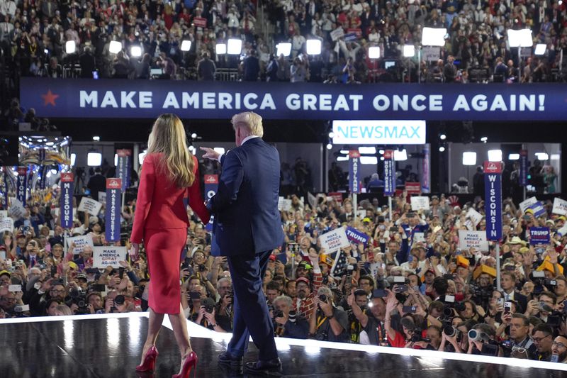 FILE - Republican presidential candidate former President Donald Trump stands on stage with former first lady Melania Trump during the final day of the Republican National Convention at the Fiserv Forum, July 18, 2024, in Milwaukee. (AP Photo/Evan Vucci)