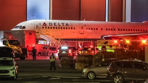 Emergency vehicles responded to the scene at a Delta Air Lines facility at Hartsfield-Jackson International Airport on Tuesday. (John Spink / John.Spink@ajc.com)