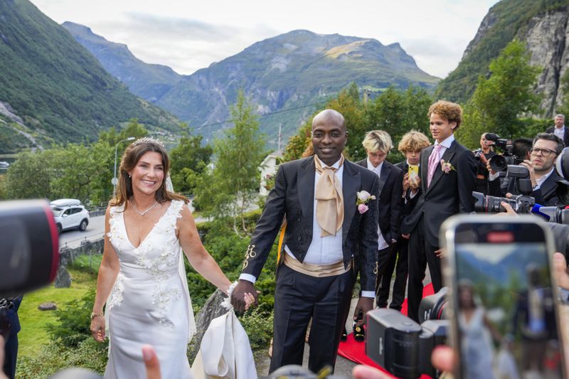 Norway's Princess Martha Louise and Durek Verrett arrive for their wedding party, in Geiranger, Norway, Saturday Aug. 31, 2024. (Cornelius Poppe/NTB via AP)