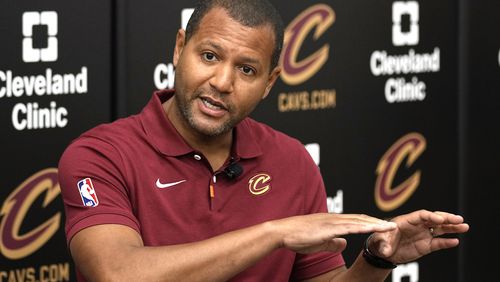 Koby Altman, president of basketball operations for the Cleveland Cavaliers, answers a question at a news conference in Brecksville, Ohio, Friday, May 24, 2024. (AP Photo/Sue Ogrocki)