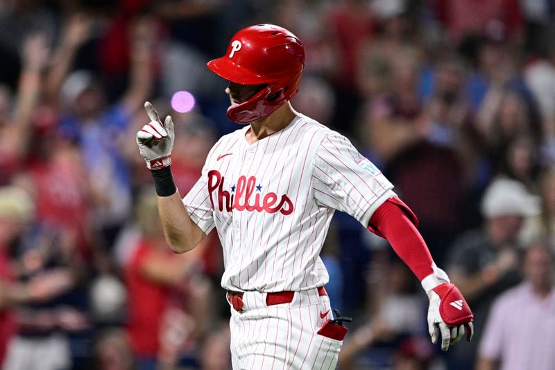 Philadelphia Phillies' Trea Turner reacts after hitting a solo home run off Atlanta Braves' Max Fried during the sixth inning of a baseball game, Saturday, Aug. 31, 2024, in Philadelphia. (AP Photo/Derik Hamilton)