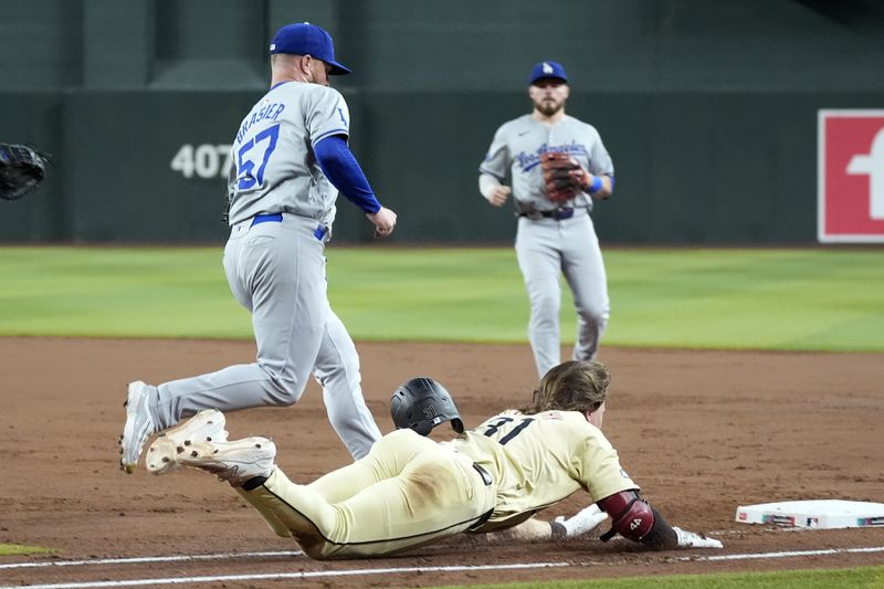 Arizona Diamondbacks' Jake McCarthy, right, beats out an infield single as he beats Los Angeles Dodgers pitcher Ryan Brasier (57) to first base as Dodgers second baseman Gavin Lux, back right, looks on during the fifth inning of a baseball game Friday, Aug. 30, 2024, in Phoenix. (AP Photo/Ross D. Franklin)