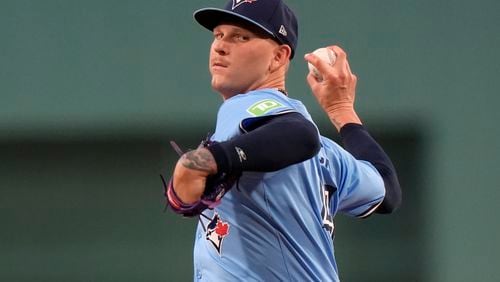 Toronto Blue Jays' Bowden Francis winds up for a pitch to a Boston Red Sox batter in the first inning of a baseball game Thursday, Aug. 29, 2024, in Boston. (AP Photo/Steven Senne)