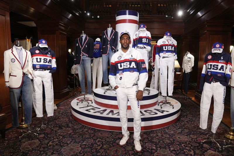Olympic athlete Jamal Hill models the Team USA Paris Olympics closing ceremony uniform at Ralph Lauren headquarters on Monday, June 17, 2024, in New York. (Photo by Charles Sykes/Invision/AP)
