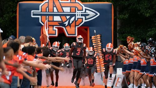 North Cobb players emerge from the tunnel prior to the Buford at North Cobb football game Friday night, September 1, 2023. (Jamie Spaar for the Atlanta Journal Constitution)