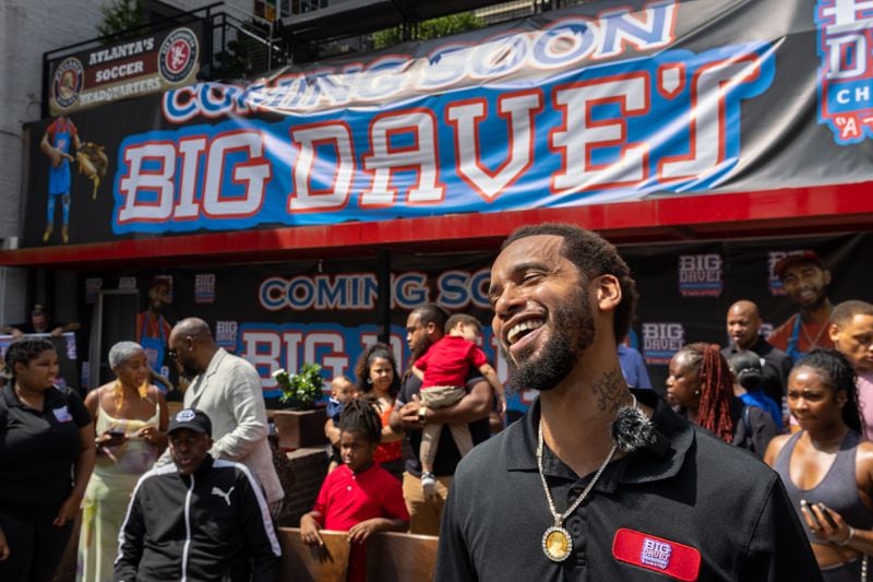 Big Dave's Cheesesteaks owner Derrick Hayes speaks to fans and media during an unveiling event at his restaurant's new flagship store in Atlanta, Monday, July 29, 2024. The former downtown store closed following water main breaks in June that caused damage to several businesses. (Arvin Temkar/AJC)