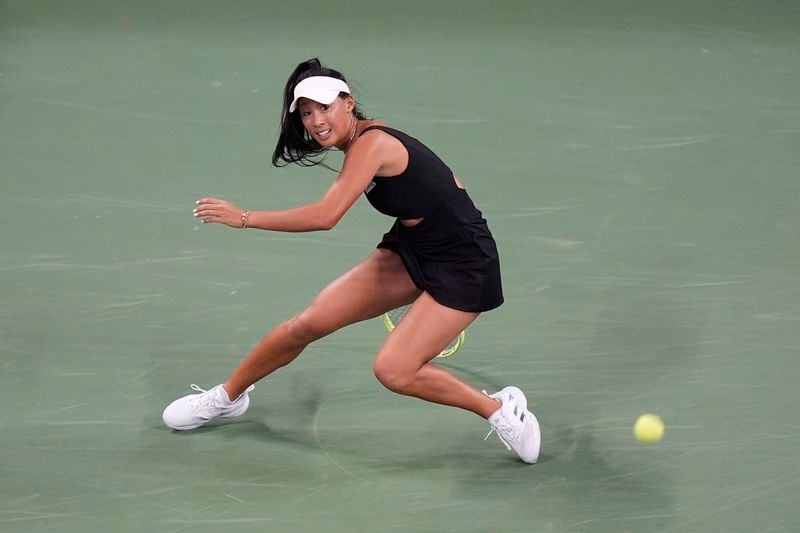 Priscilla Hon, of Australia, returns a shot to Aryna Sabalenka, of Belarus, during a first round match of the U.S. Open tennis championships, Monday, Aug. 26, 2024, in New York. (AP Photo/Frank Franklin II)