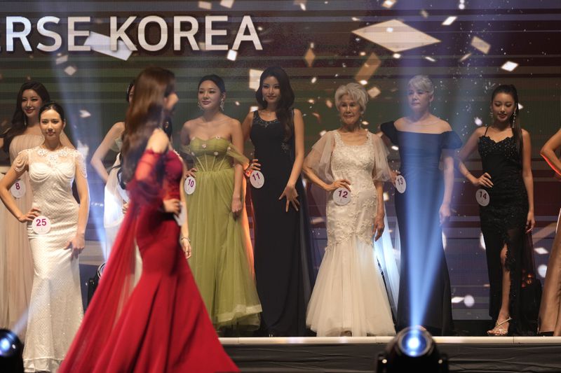 South Korean Choi Soon-hwa, 81-year-old, third from right, attends the 2024 Miss Universe Korea in Seoul, South Korea, Monday, Sept. 30, 2024. (AP Photo/Lee Jin-man)