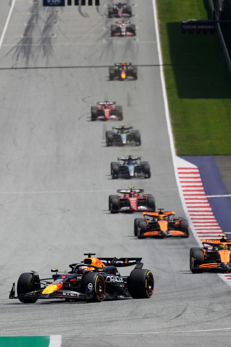 Red Bull driver Max Verstappen of the Netherlands, left, leads the field during sprint race at the Red Bull Ring racetrack in Spielberg, Austria, Saturday, June 29, 2024. The Austrian Formula One Grand Prix will be held on Sunday. (AP Photo/Darko Bandic)