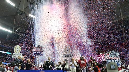 Confetti and fireworks fill the Georgia Dome as Nick Saban and his Alabama team celebrate a 24-7 victory over Washington in the 2016 Chick-fil-A Peach Bowl in Atlanta.