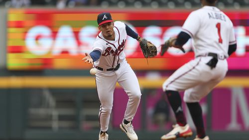 Atlanta Braves shortstop Vaughn Grissom tosses the ball to Atlanta Braves second baseman Ozzie Albies (1) to get out Miami Marlins’ Jesus Sanchez (not pictured) on a ground ball during the second inning at Truist Park, Thursday, April 27, 2023, in Atlanta. Jason Getz / Jason.Getz@ajc.com)