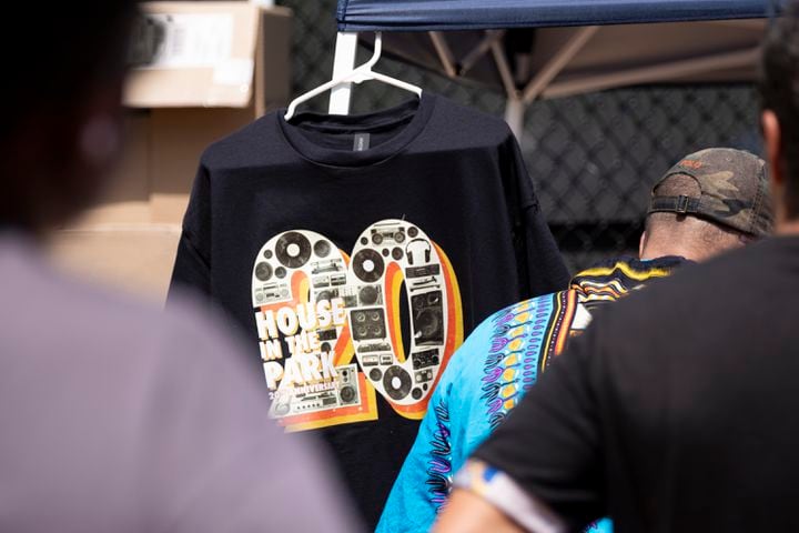 People line up to buy T-shirts at the 20th anniversary of the House In The Park music festival in Atlanta on Sunday, Sept. 1, 2024. (Ben Gray / Ben@BenGray.com)