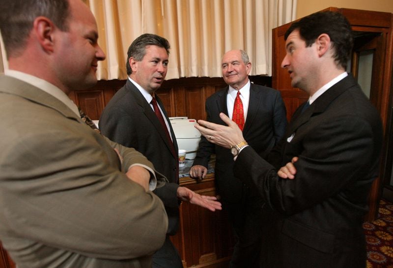 John Watson, right, talks with then-Gov. Sonny Perdue, then-House Speaker Glenn Richardson and Jay Walker in 2006. (BEN GRAY/AJC staff)