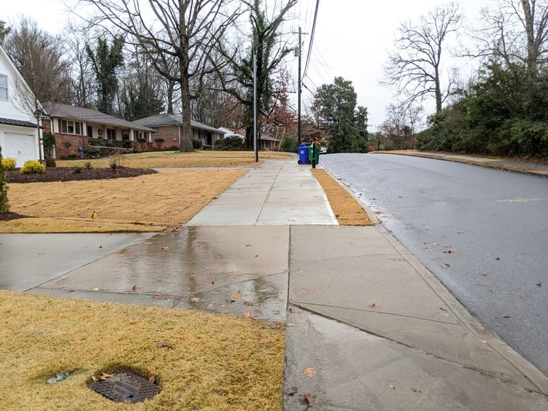 Brookhaven is building its path network one property at a time by requiring developers to either build segments in front of their projects or pay into a fund, depending on whether they are building along a planned route. This new segment is in front of a house on Caldwell Road near Brookhaven City Hall on Dec. 23, 2019. TY TAGAMI / TY.TAGAMI@AJC.COM