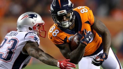 Demaryius Thomas #88 of the Denver Broncos carries the ball against Patrick Chung #23 of the New England Patriots at Sports Authority Field at Mile High on November 12, 2017 in Denver, Colorado. (Matthew Stockman/Getty Images/TNS)