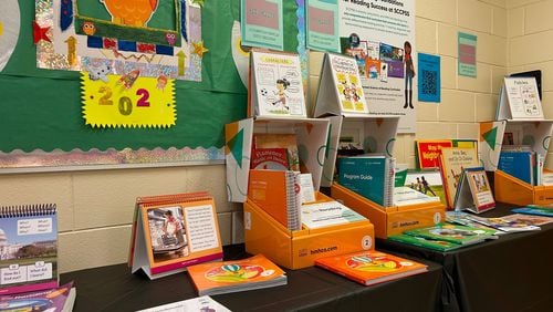 English language arts (ELA) textbooks from publisher Houghton Mifflin Harcourt sit on display at Savannah's Leiston Shuman Elementary School ahead of a community curriculum review opportunity on Thursday Nov. 16, 2023.