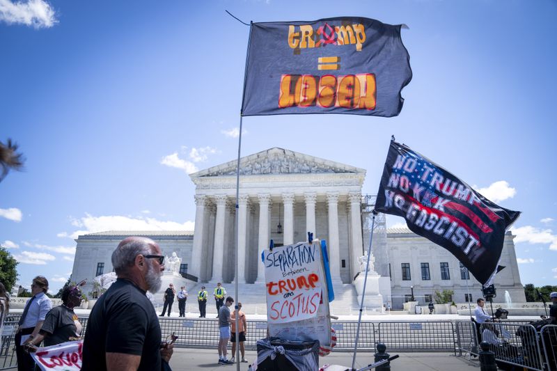 People protest outside of the Supreme Court, Monday, July 1, 2024, after court decisions were announced in Washington. (AP Photo/Jacquelyn Martin)