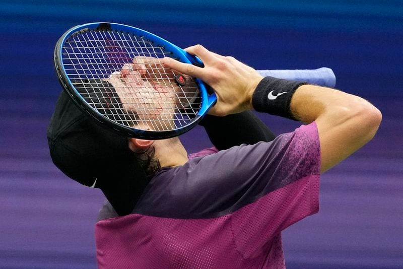 Jack Draper, of Great Britain, reacts against Jannik Sinner, of Italy, during the men's singles semifinals of the U.S. Open tennis championships, Friday, Sept. 6, 2024, in New York. (AP Photo/Kirsty Wigglesworth)