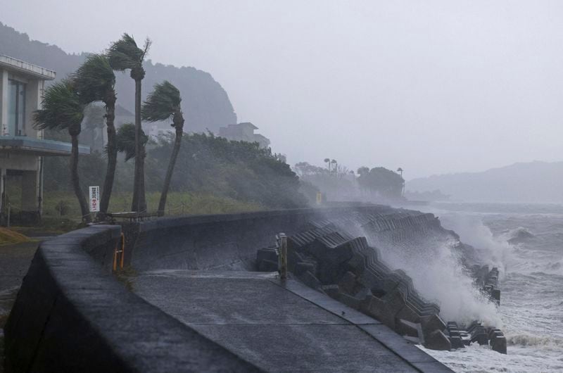 High waves hit a coastal area in Ibusuki, Kagoshima prefecture, western Japan, Wednesday, Aug. 28, 2024, as a typhoon is approaching. (Hidetaka Komukai/Kyodo News via AP)