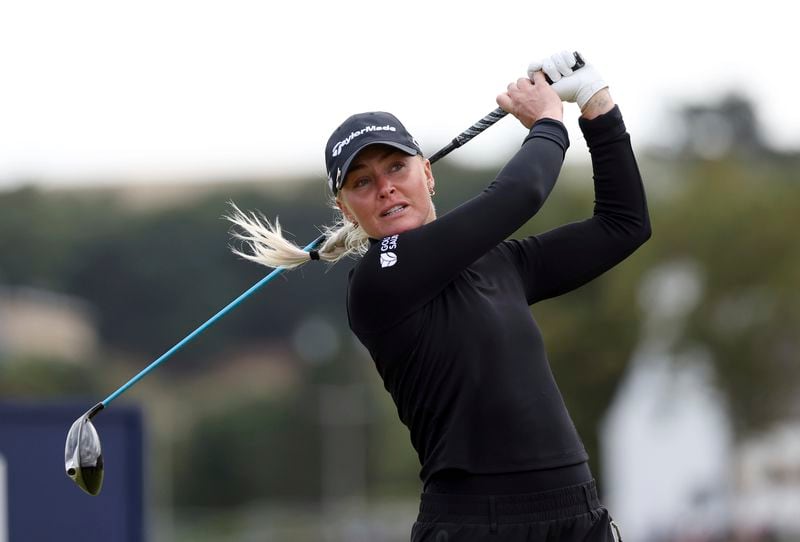 England's Charley Hull plays her tee shot from the 3rd during the first round of the Women's British Open golf championship, in St Andrews, Scotland Thursday, Aug. 22, 2024. (AP Photo/Scott Heppell)