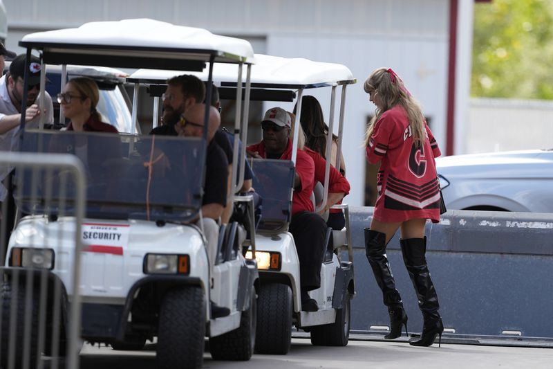 Taylor Swift arrives before the start of an NFL football game between the Kansas City Chiefs and the Cincinnati Bengals Sunday, Sept. 15, 2024, in Kansas City, Mo. (AP Photo/Charlie Riedel)