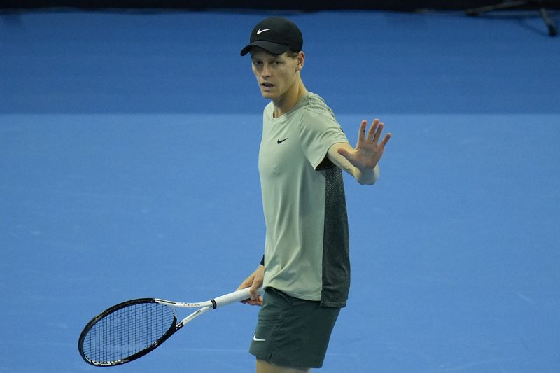 Jannik Sinner of Italy gestures during their men's singles finals match against Carlos Alcaraz of Spain at the China Open tennis tournament, National Tennis Center in Beijing, Wednesday, Oct. 2, 2024. (AP Photo/Andy Wong)