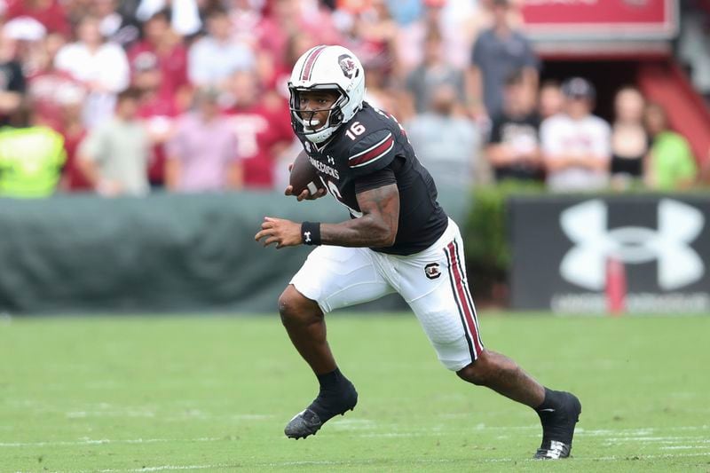 South Carolina quarterback LaNorris Sellers (16) runs for a short gain during the first half of an NCAA college football game against LSU, Saturday, Sept. 14, 2024 in Columbia, S.C. (AP Photo/Artie Walker Jr.)