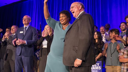 Former House Minority Leader Stacey Abrams, the Democratic nominee for governor, with her House leadership predecessor, DuBose Porter. (ALYSSA POINTER/ALYSSA.POINTER@AJC.COM)