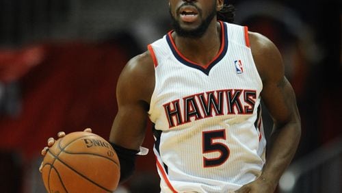 Atlanta Hawks DeMarre Carroll dribbles the basketball against the Sacramento Kings on Wednesday, December 18, 2013, in Philips Arena. The Hawks won the game 124 to 107 and Korver had 28 points.