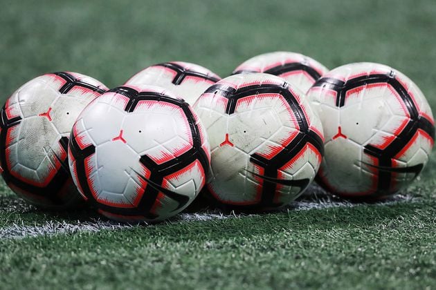 MLS soccer balls sit on the field for Atlanta United and Monterrey in thier CONCACAF Champions League quarterfinal match Wednesday, March 13, 2019, in Atlanta.