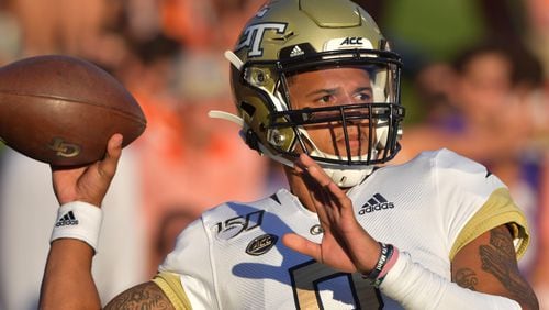 Georgia Tech quarterback Tobias Oliver (8) warms up before their game against the Clemson at Memorial Stadium on the Clemson University campus in Clemson, S.C. on Thursday, August 29, 2019. Georgia Tech took the field for the first time with Geoff Collins as head coach. (Hyosub Shin / Hyosub.Shin@ajc.com)