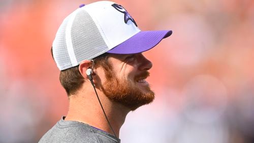 Minnesota Vikings quarterback Sam Darnold watches from the sidelines during the first half of an NFL preseason football game against the Cleveland Browns, Saturday, Aug. 17, 2024, in Cleveland. (AP Photo/David Richard)