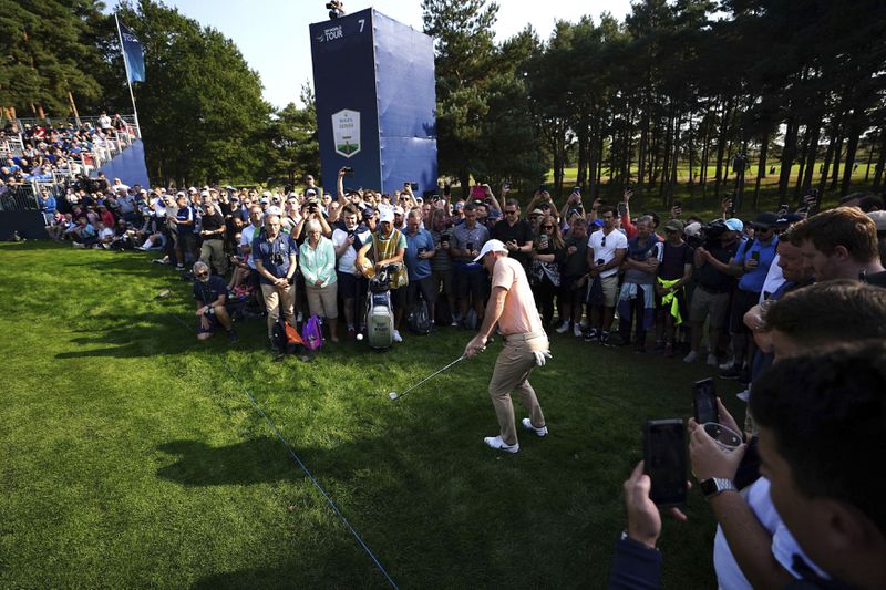 England's Justin Rose looks for his ball in the rough on the 6th during day two of the 2024 BMW PGA Championship at Wentworth Golf Club in Virginia Water, England, Friday Sept. 20, 2024. (Zac Goodwin/PA via AP)