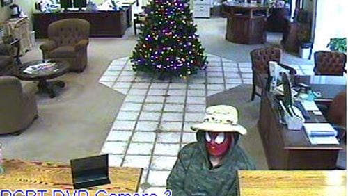 The GBI is seeking the public’s help to identify this robber, who was wearing a Spider-Man mask during a heist at a Cornelia bank on Tuesday, Dec. 22, 2015. (Surveillance)