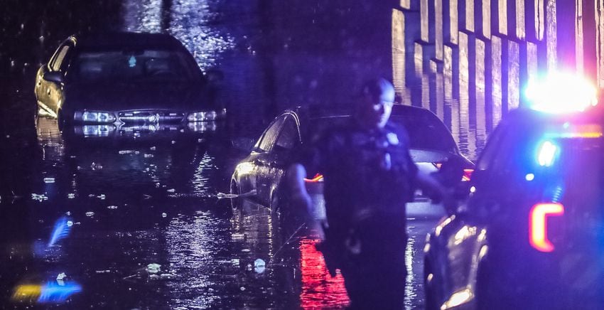 Cars submerged Glen Street