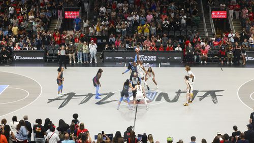 Atlanta Dream forward Cheyenne Parker-Tyus (32) and Indiana Fever forward Aliyah Boston (7) jump for the opening tip off for their game at State Farm Arena, Friday, June 21, 2024, in Atlanta. (Jason Getz / AJC)
