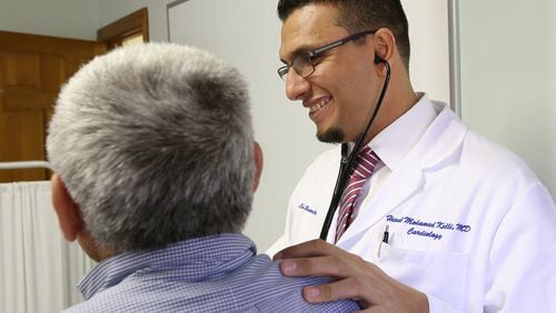 March 16, 2017, Clarkston: Dr. Heval Mohamed Kelli sees his patient Taha, a Syrian refugee, to check his health at the Clarkston Community Health Center on Thursday, March 16, 2017, in Clarkston. Curtis Compton/ccompton@ajc.com