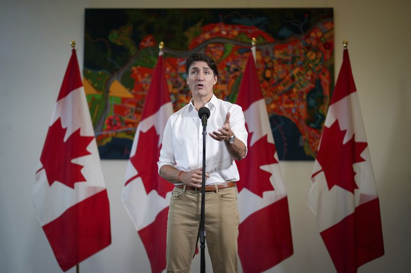 Canada Prime Minister Justin Trudeau speaks to reporters at the Liberal Caucus retreat in Nanaimo, British Columbia, Wednesday, Sept. 11, 2024. (Darryl Dyck/The Canadian Press via AP)