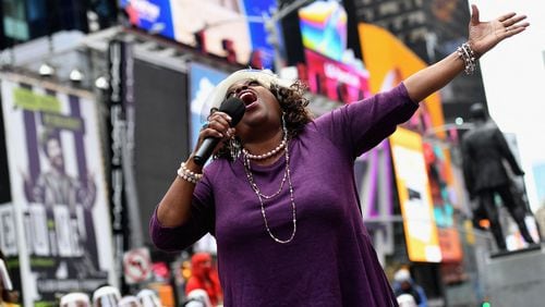 Broadway performer Lilias White participates in "We Will Be Back," a live pop-up event and commemoration of Broadway's "lost year" at Times Square on March 12 in New York. The Times Square New Year's Eve party was canceled for 2021 but will return on Dec. 31 to ring in 2022. (Angela Weiss/AFP via Getty Images/TNS)