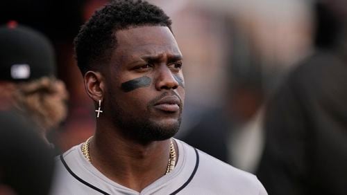 San Francisco Giants designated hitter Jorge Soler (2) looks out of the dugout before a baseball game against the Atlanta Braves, Wednesday, July 3, 2024, in Atlanta. (AP Photo/Brynn Anderson)